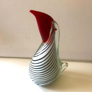 Glass figures of bird.